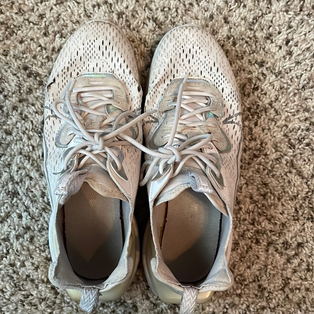 Nike, size 9.5, metallic Nike symbol